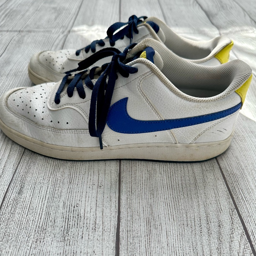 Nike size 10.5 white leather sneakers